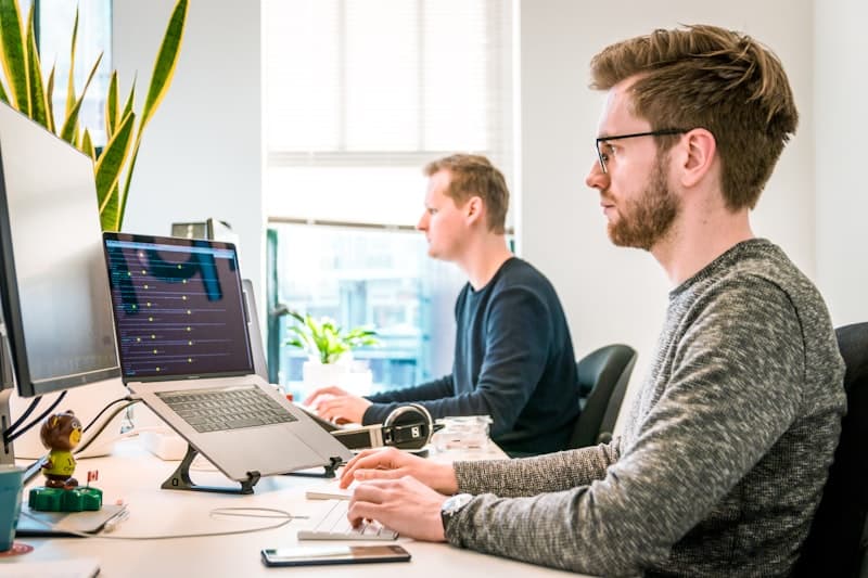 Engineers reviewing an application they support